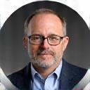 Professional headshot of David Fischer, an investigative reporter